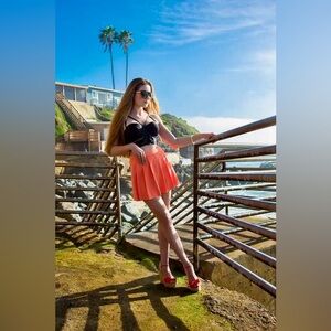 Orange pleated skort Size 4/S BEBE